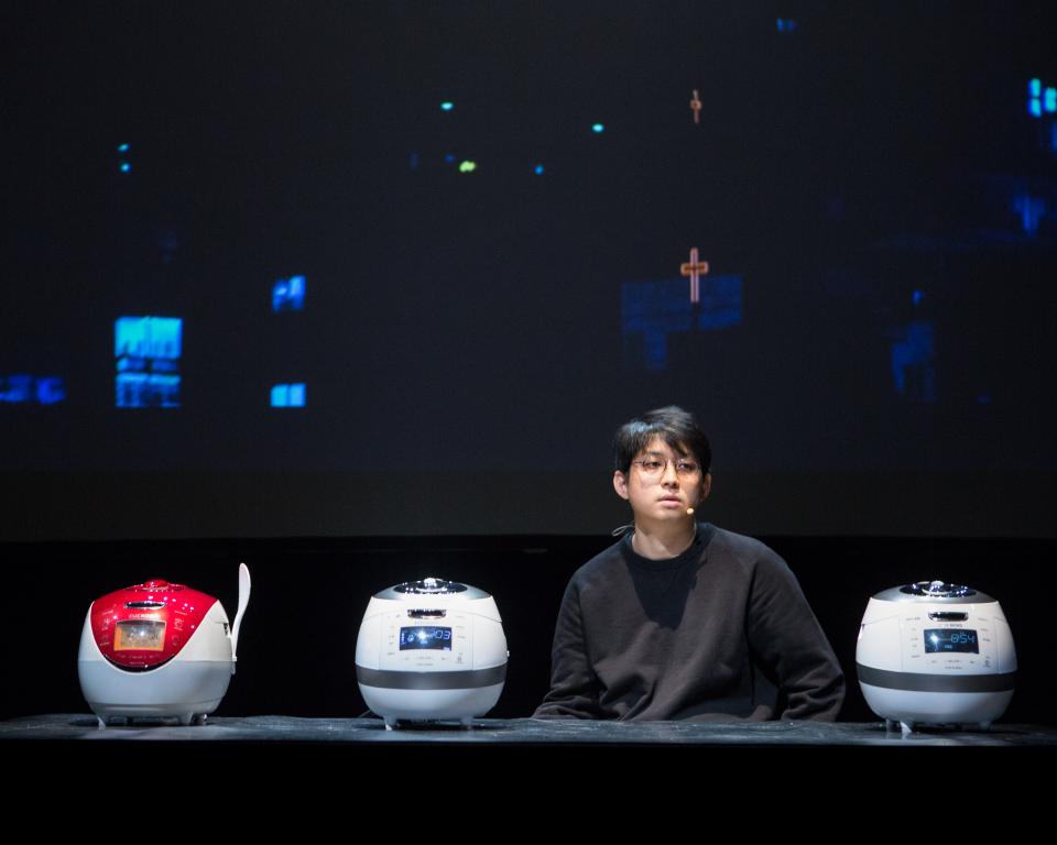 Man with rice cookers