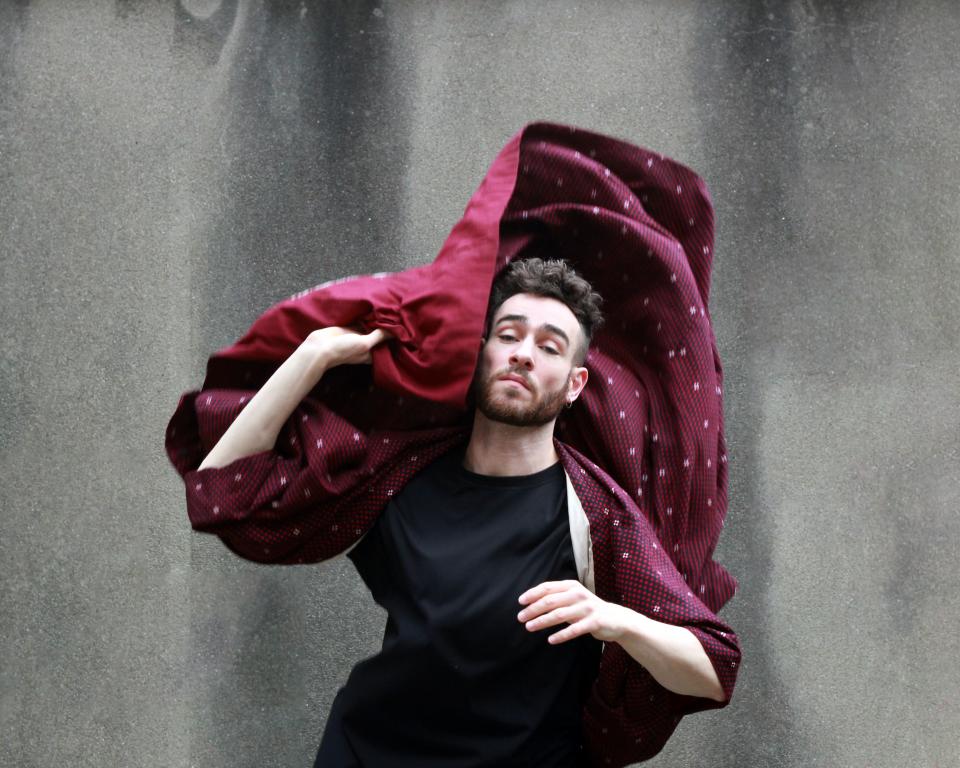 Man moving with kimono billowing