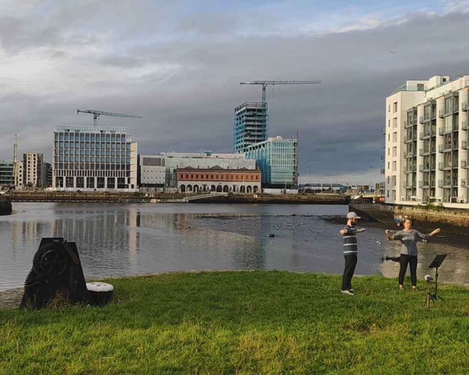 Two musicians playing at grand canal dock