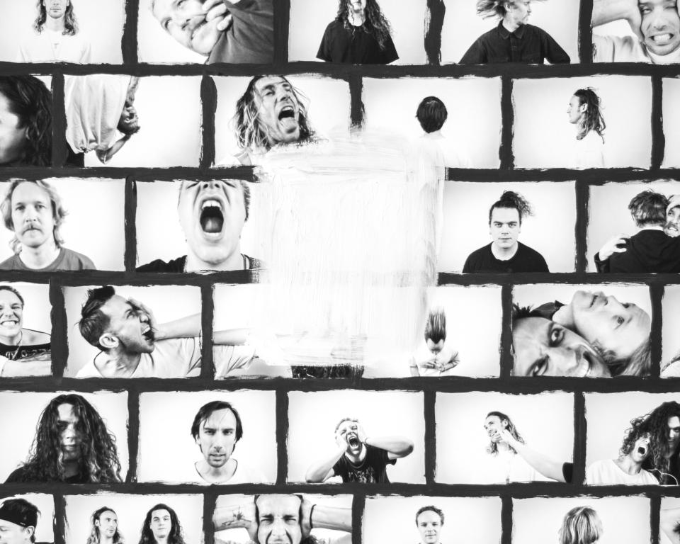 A black-and-white collage of expressive portraits featuring multiple people in varying emotional states. Each square frame shows close-up shots of faces screaming, staring, turning, or holding their heads. The frames are bordered in black brushstrokes, with a central portion obscured by a white painted section, adding a raw, chaotic feel to the image.