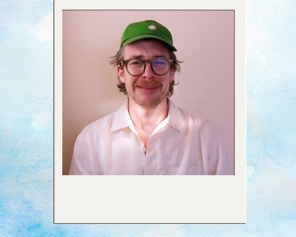 Man in polaroid picture crying