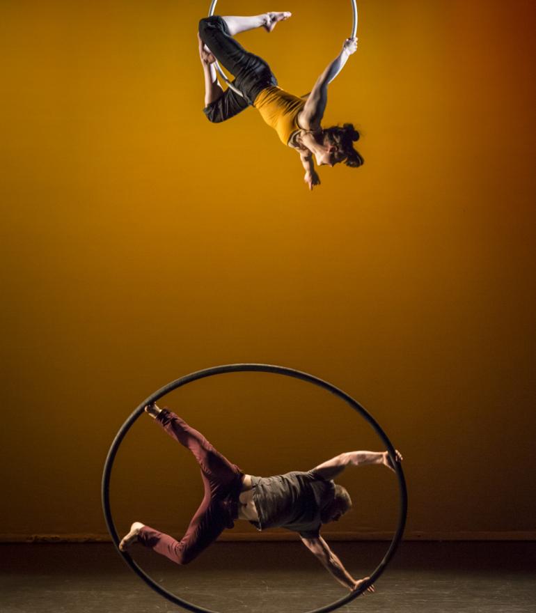 How to square a circle, a man in a circle, a woman hanging above