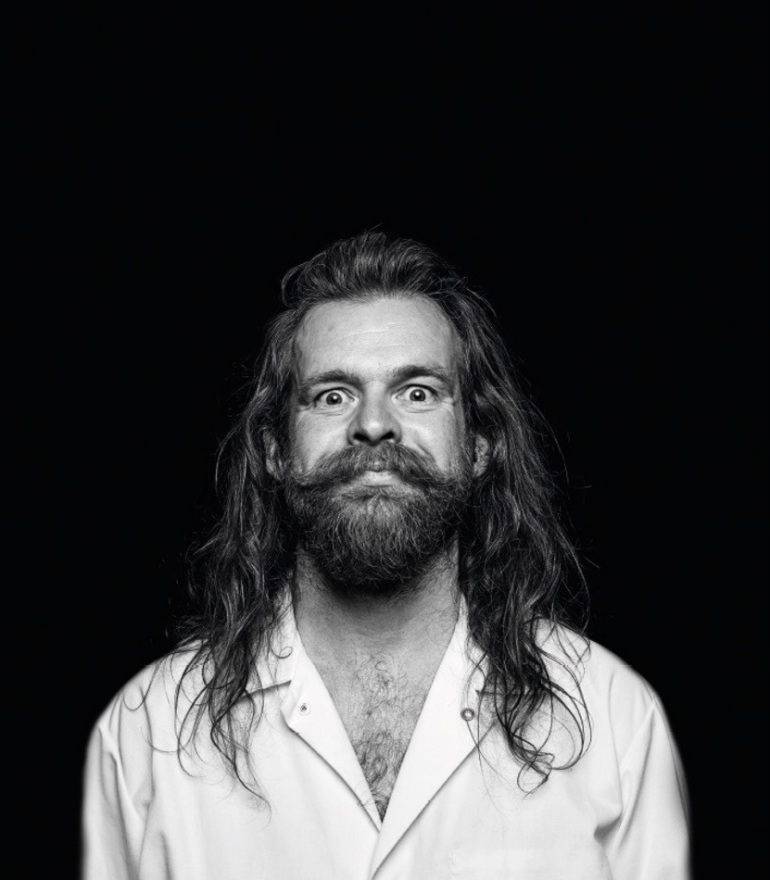 Image of Paul Currie against a black background