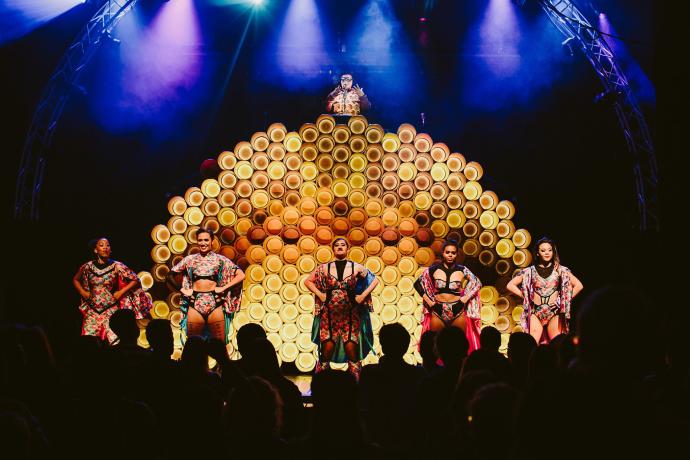 Artists Hot Brown Honey performing as the hive onstage
