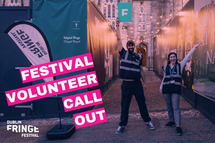 two festival volunteers standing in a lane