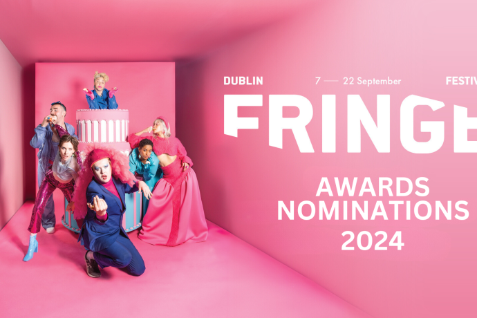 group of people in pink room
