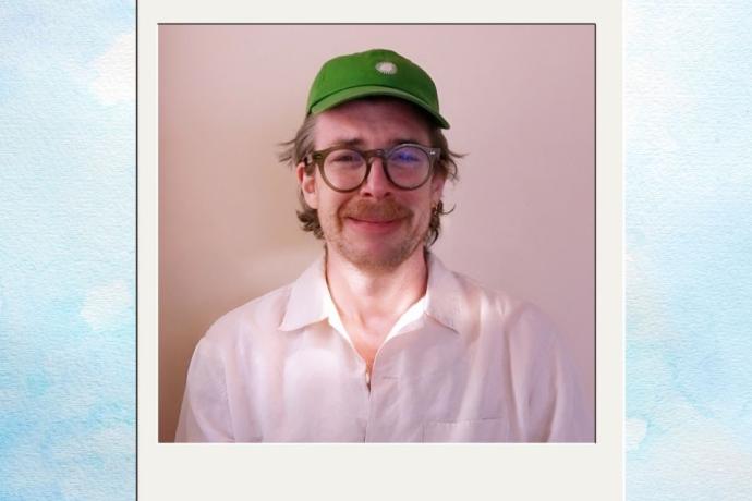 Man in polaroid picture crying