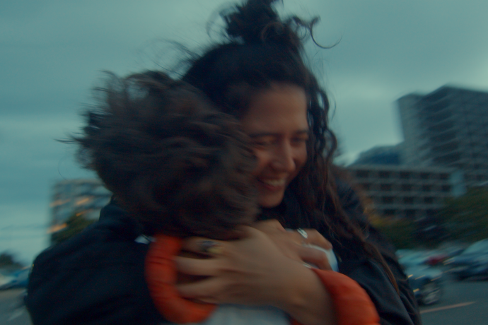 Two woman embracing