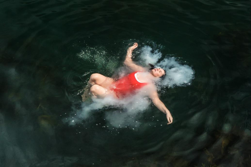 Woman floating in water