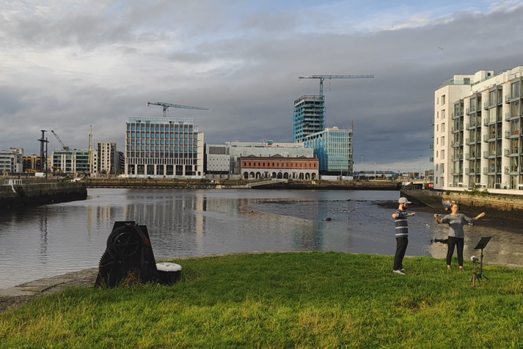 Two musicians playing at grand canal dock