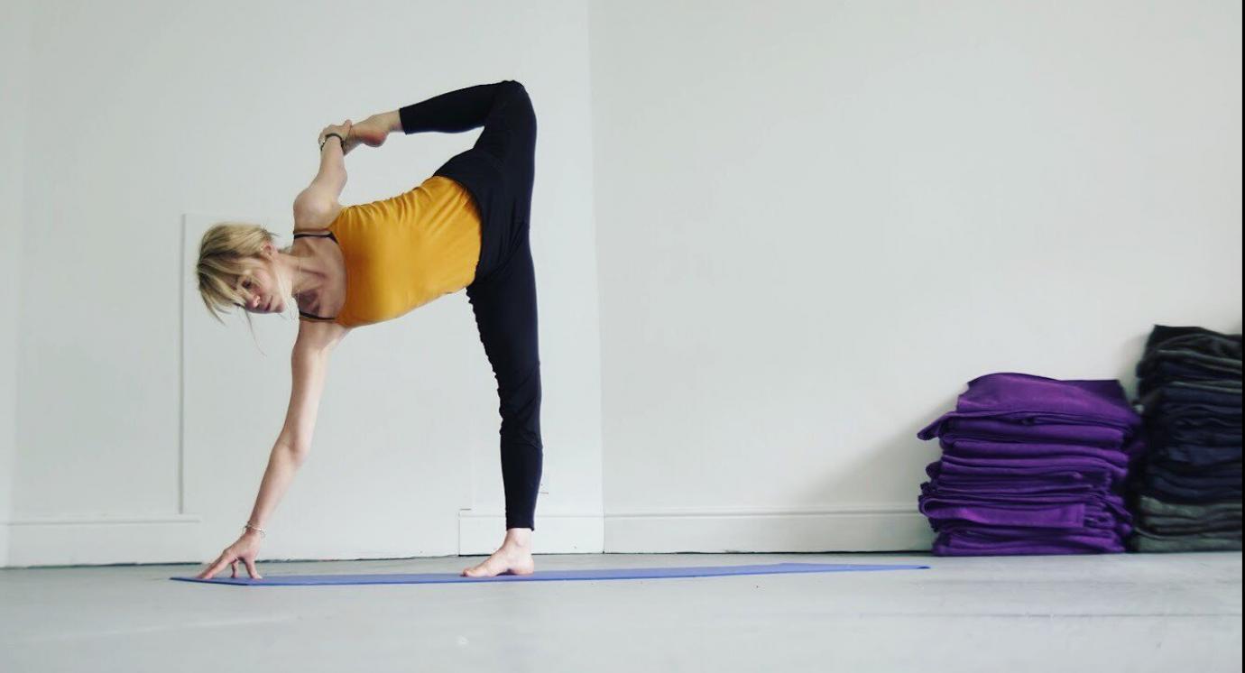 Woman stretching in yoga pose